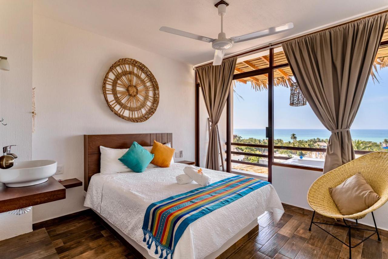 Punta Kai Hotel & Hostal بويرتو إسكونديدو المظهر الخارجي الصورة