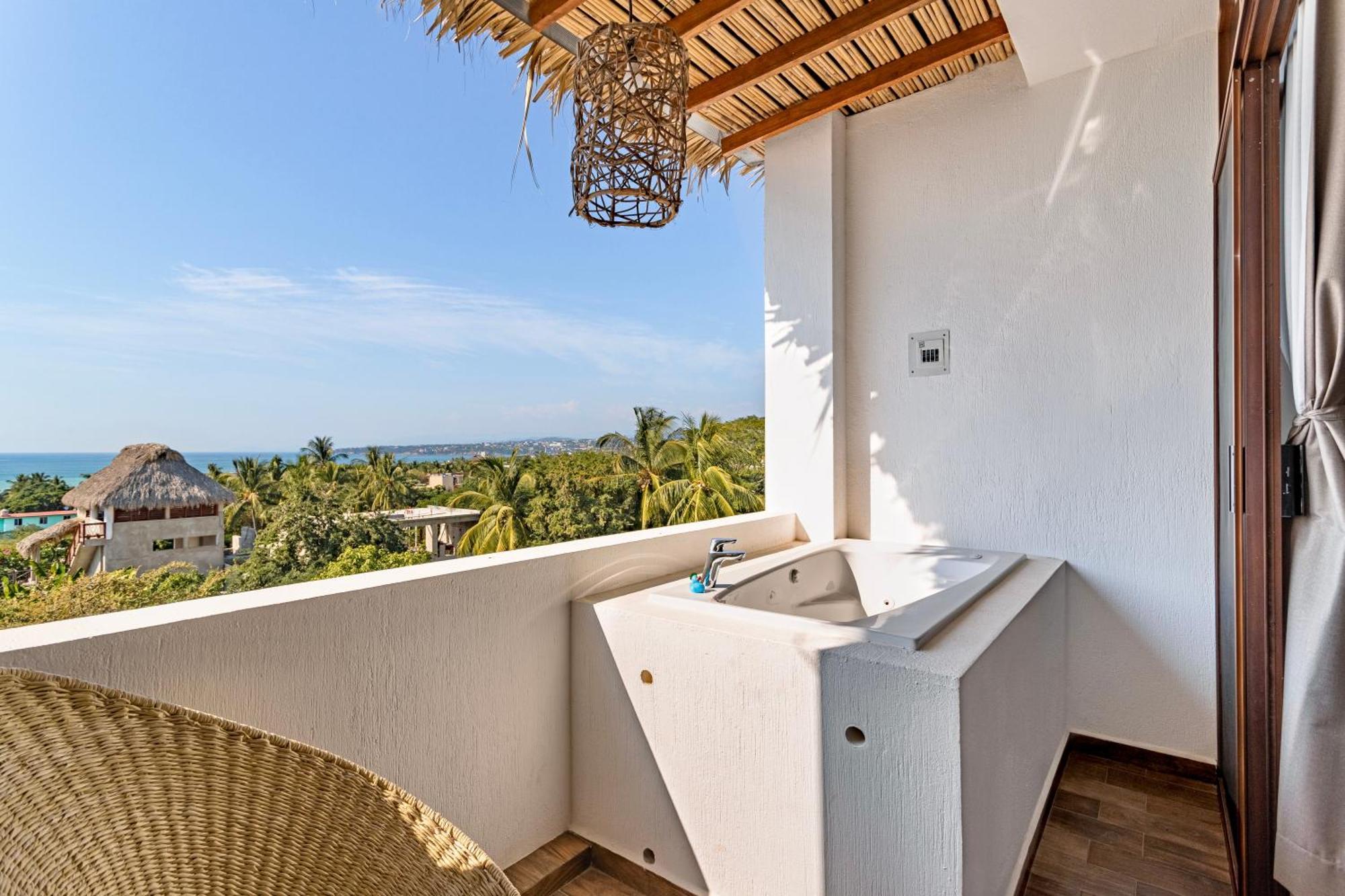 Punta Kai Hotel & Hostal بويرتو إسكونديدو الغرفة الصورة